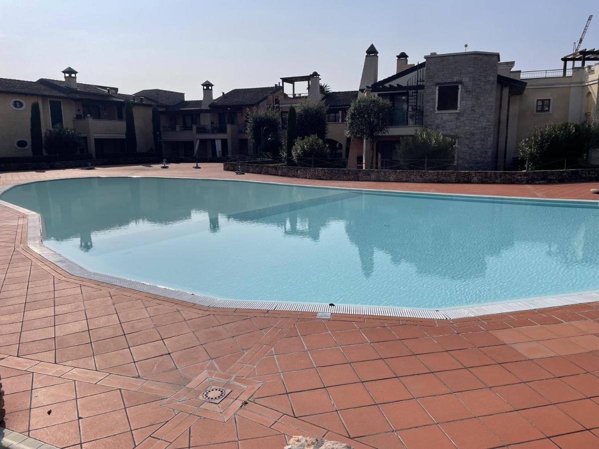 La Rocca di Manerba relaxing pool By Bookinggardalake - B&B Manerba del Garda