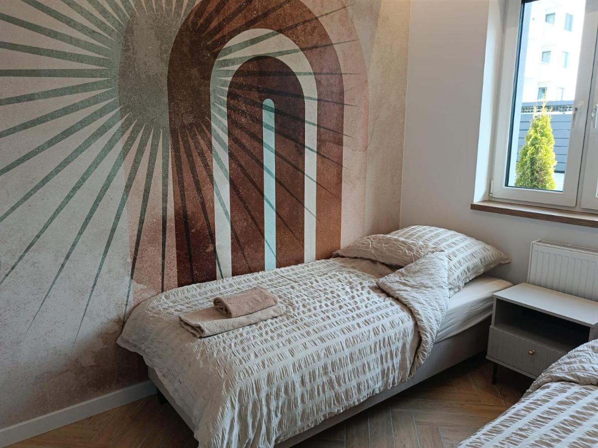 PREMIUM III Apartaments - Chambres d'hôtes Uniejów