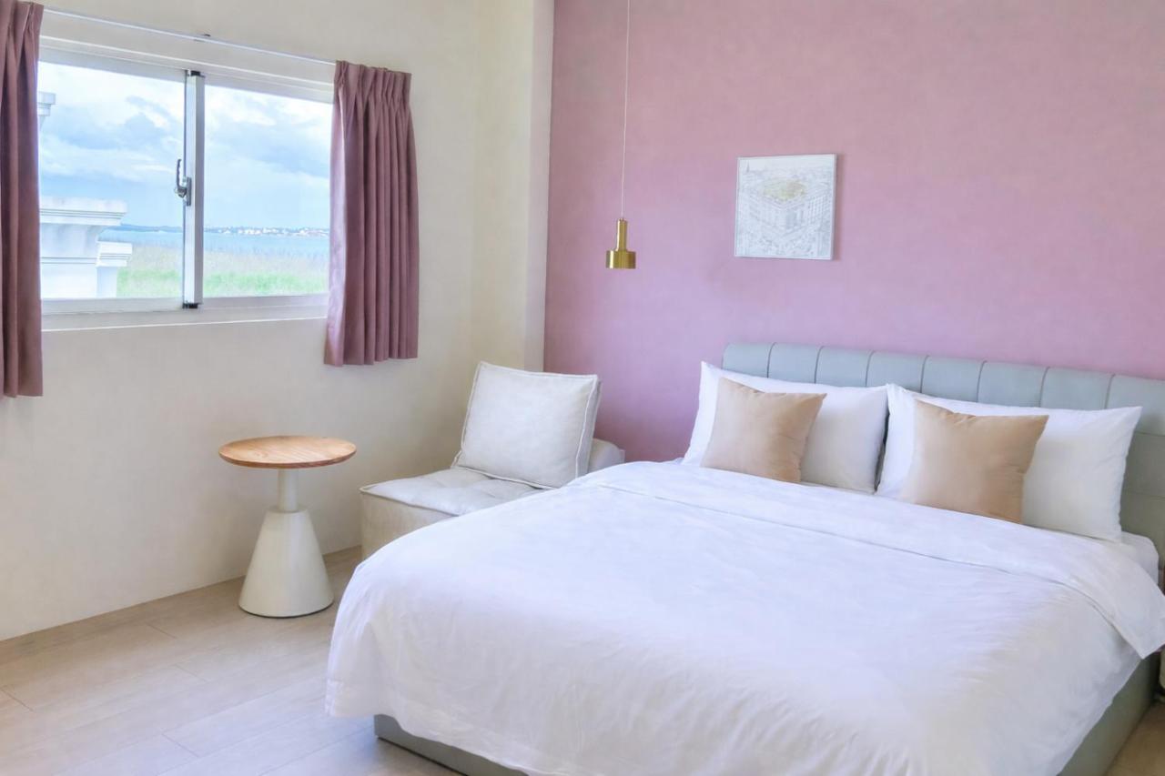 Habitación Doble Deluxe con vistas laterales al mar