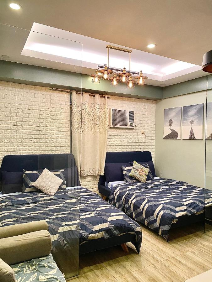 Cozy Escape at McKinley near Venice Grand Canal Mall - B&B Manila