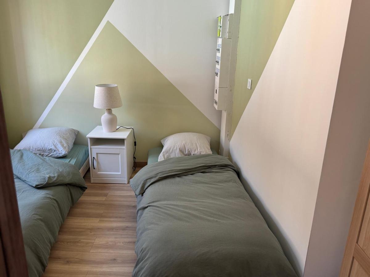 Gîte au clocher vrillé - B&B Niedermorschwihr