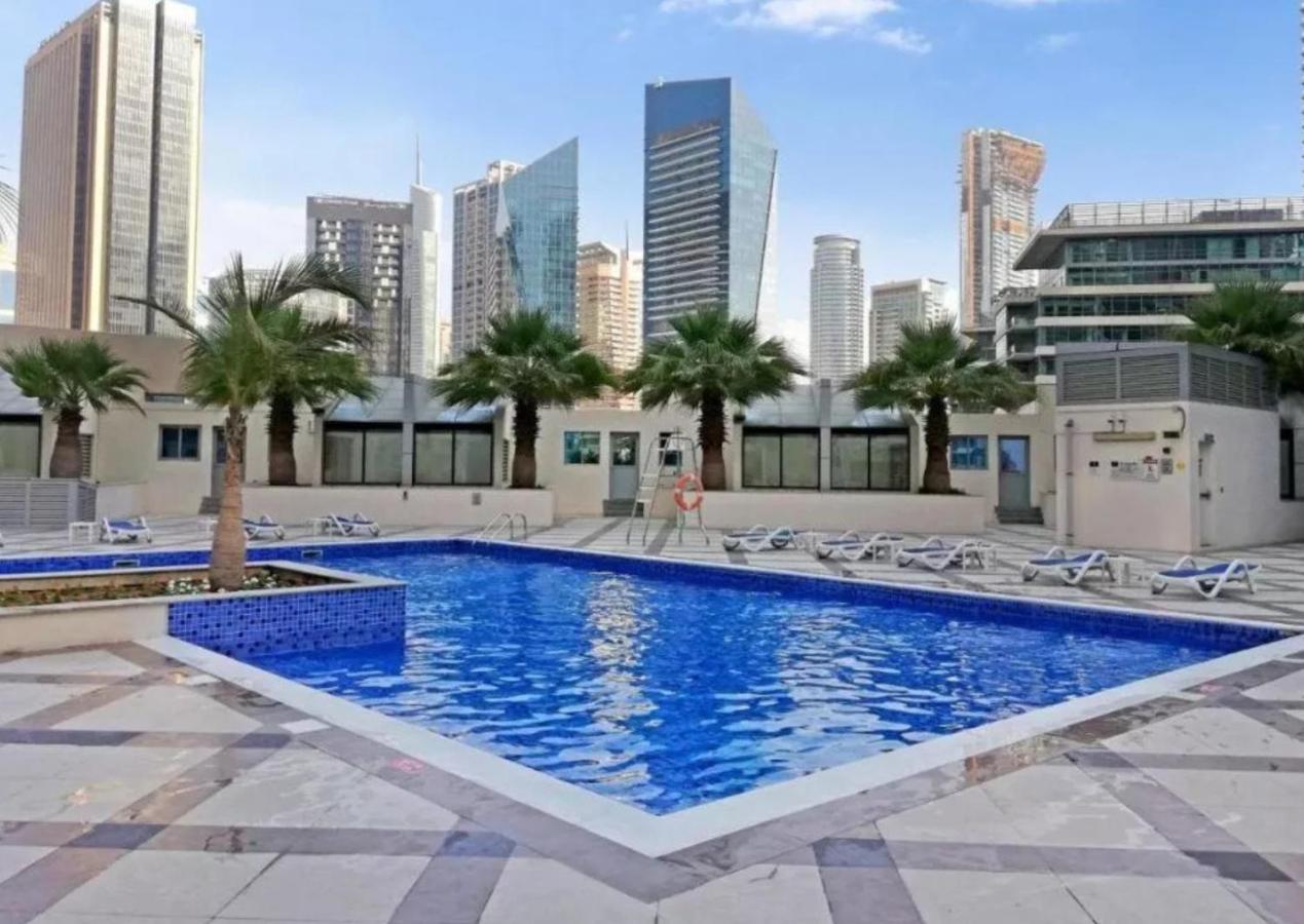 Vacationer Holiday Homes I Lux 3 Bedroom Apartment I Steps from Barasti Beach - Chambres d'hôtes Dubaï