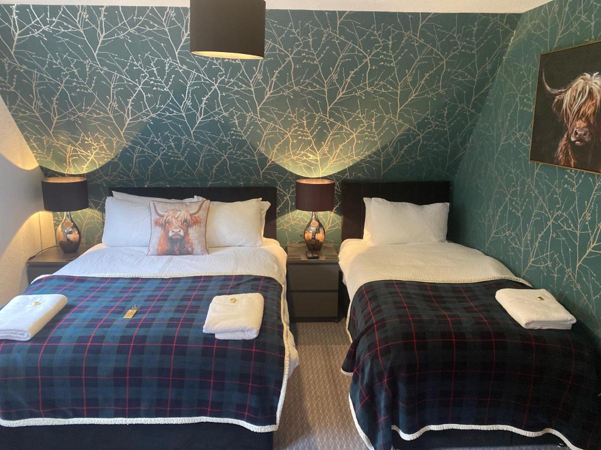 Camera Familiare con Vista Giardino