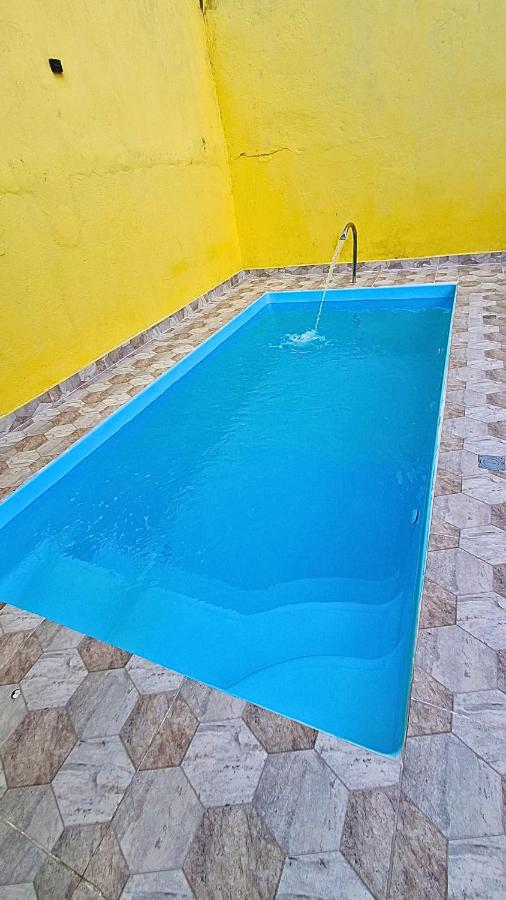 casa com piscina em Mongaguá - Chambres d'hôtes Mongaguá