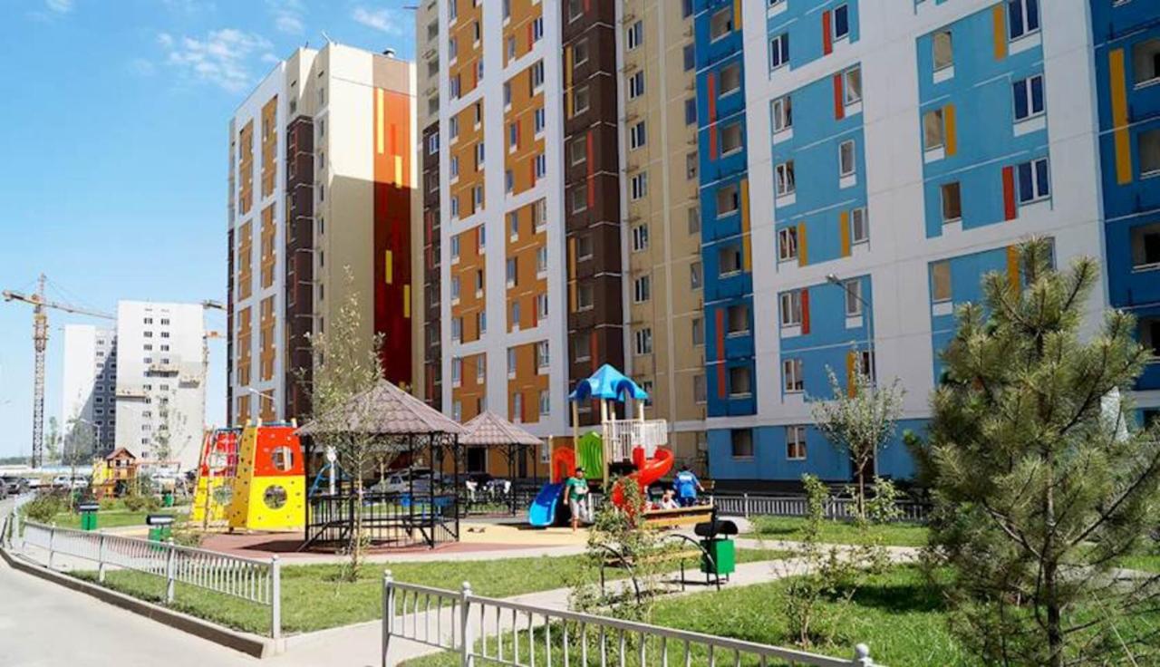 Отличная квартира напротив спорткомплекса Almaty Arena - Chambres d'hôtes Almaty