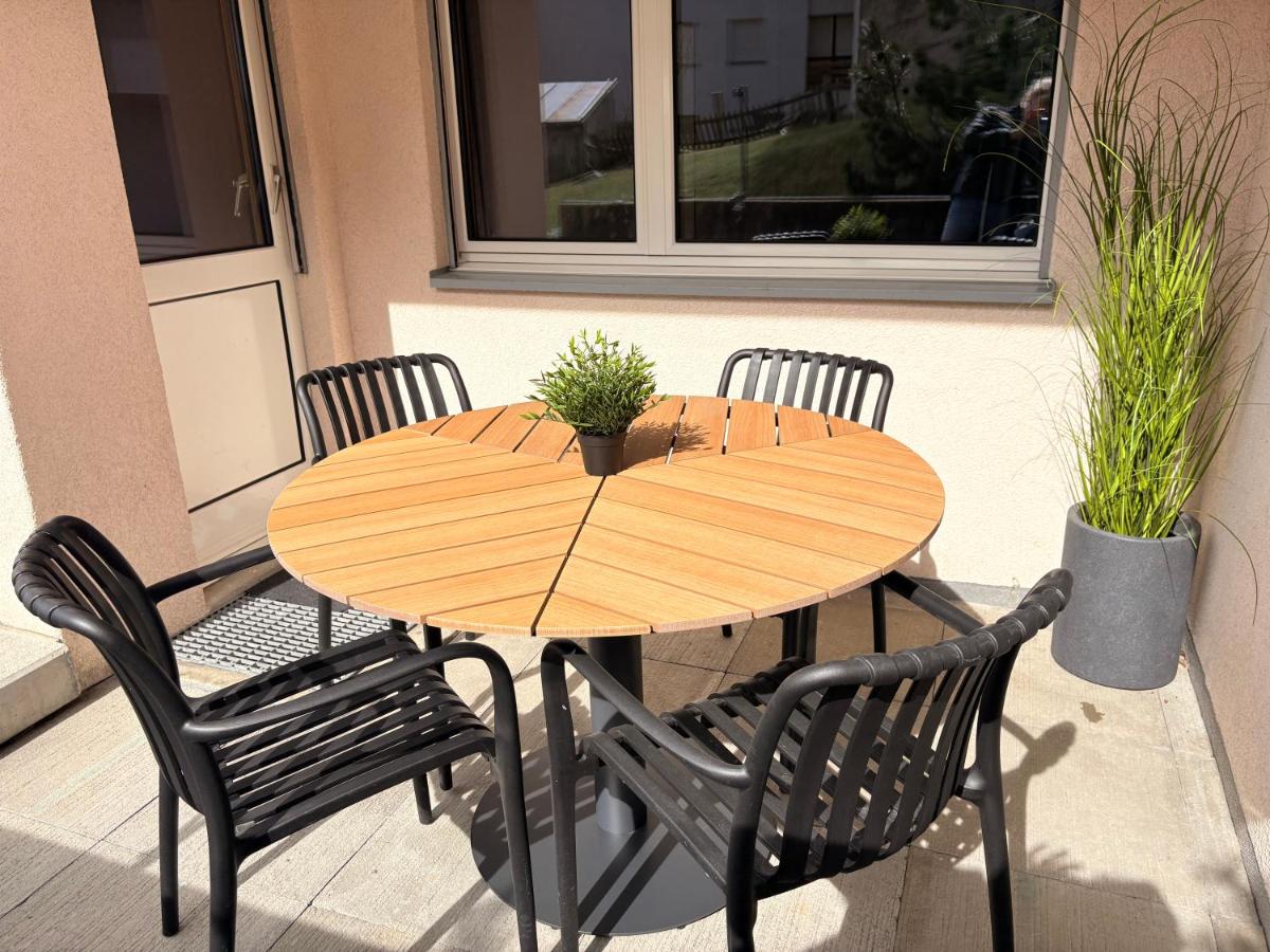 Ambiente Appartement C2 - moderne Ferienwohnung mit Terrasse in Leukerbad - B&B Leukerbad