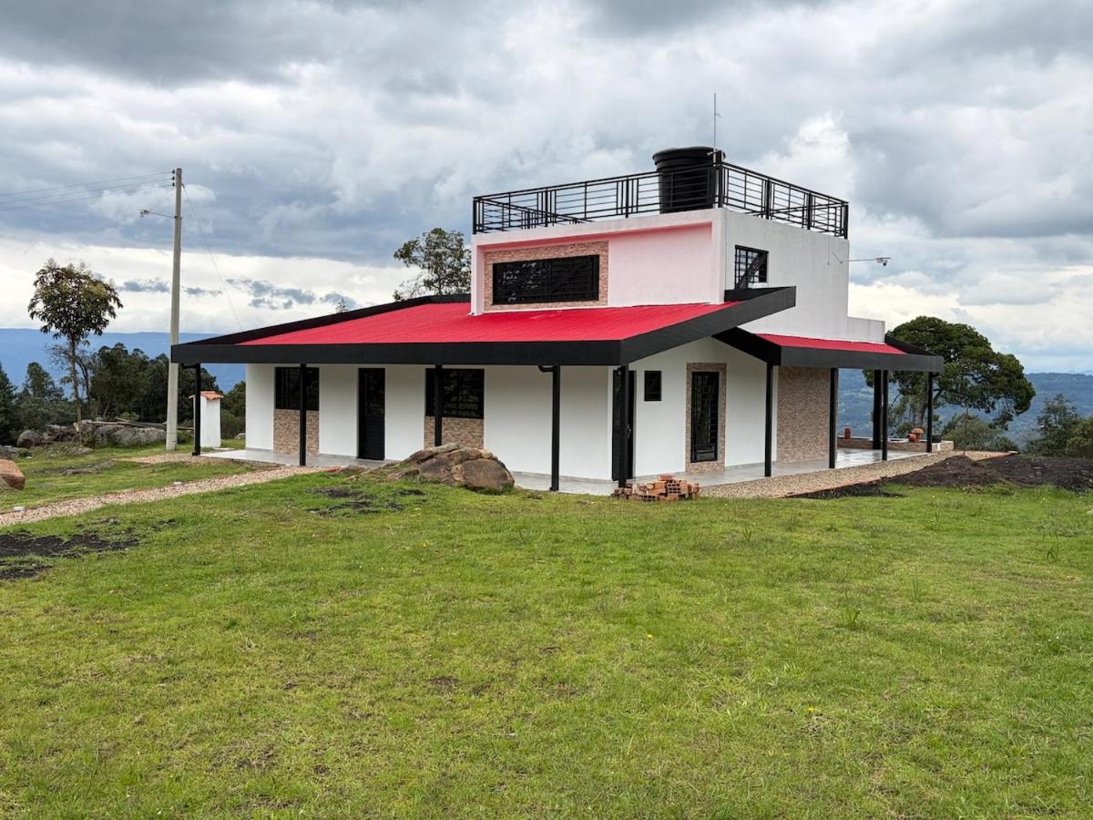 Villa El Encanto Casa campestre con fogata y vista - Chambres d'hôtes Tinjacá