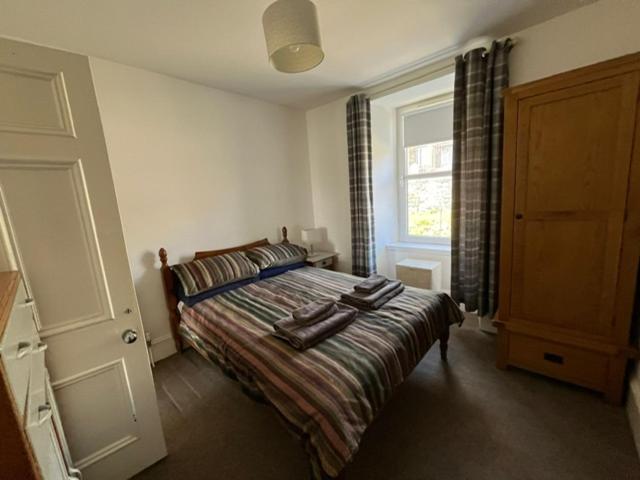 Centrally located 1 bed modern flat with harbour views - Chambres d'hôtes Wick