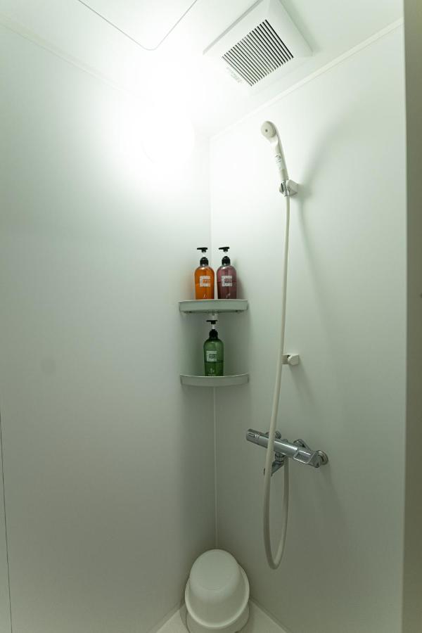 Camera Familiare con Bagno in Comune