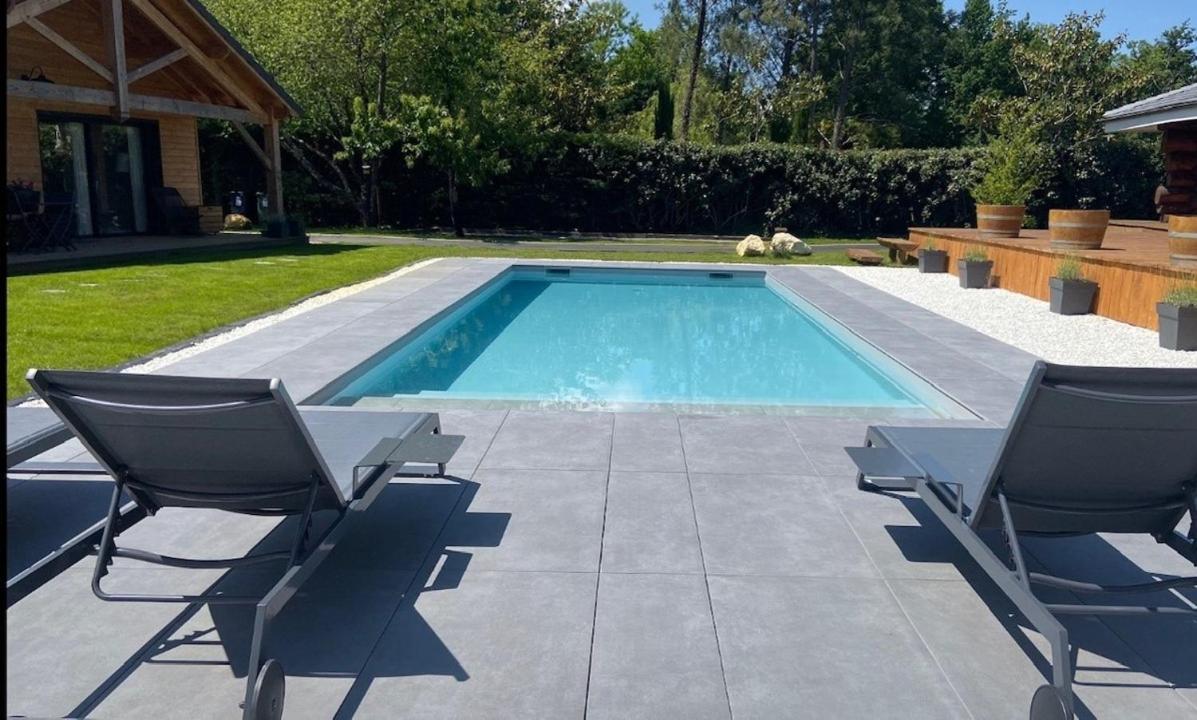 Les chalets du Médoc en bois aux accents de fuste canadienne avec piscine - B&B Saint-Aubin-de-Médoc