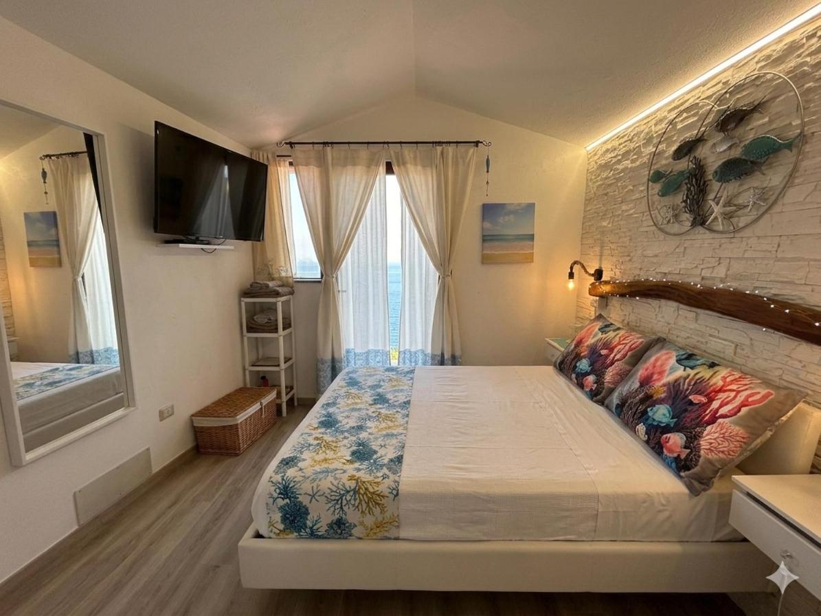 Oasi del Relax - Seaside Peaceful Panoramic Terrace in ITALY - new Sardinia apartment 50 mt beach&sea full comfort air conditioning-WiFi-Parking-Privacy - Chambres d'hôtes Torre dei Corsari