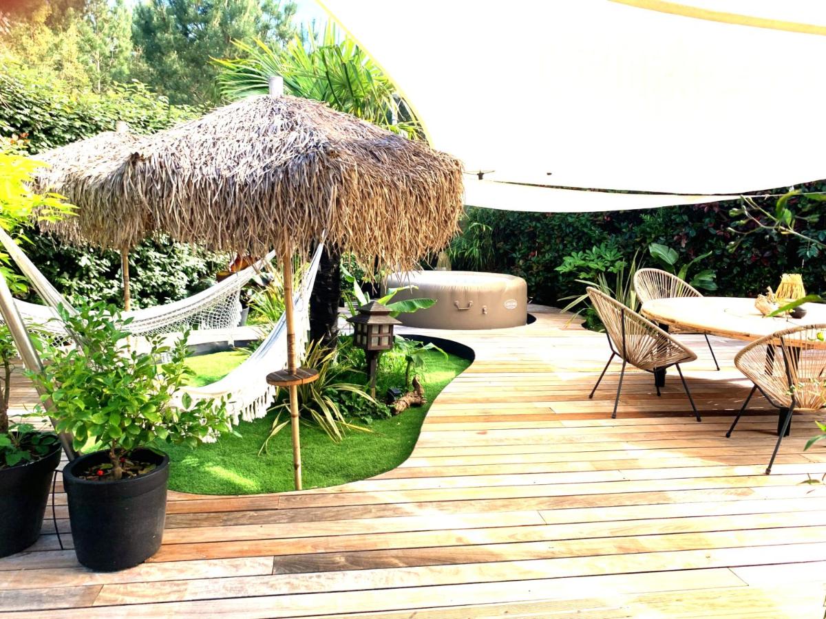 Maison ambiance cabane exotique climatisée piscine & spa 3 chambres 6 personnes - Chambres d'hôtes Messanges