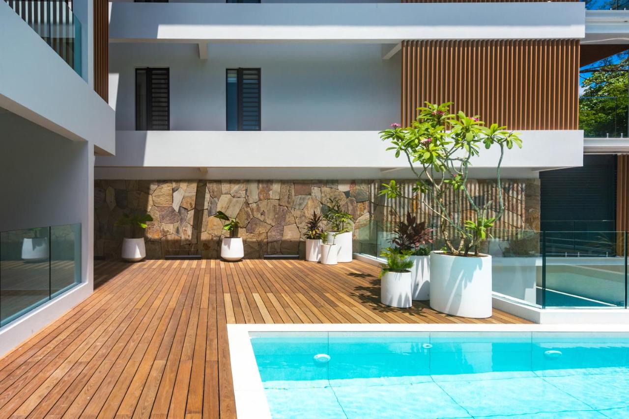 Cosy 1BR Apt with Pool, steps from Pereybere Beach - B&B Péreybère