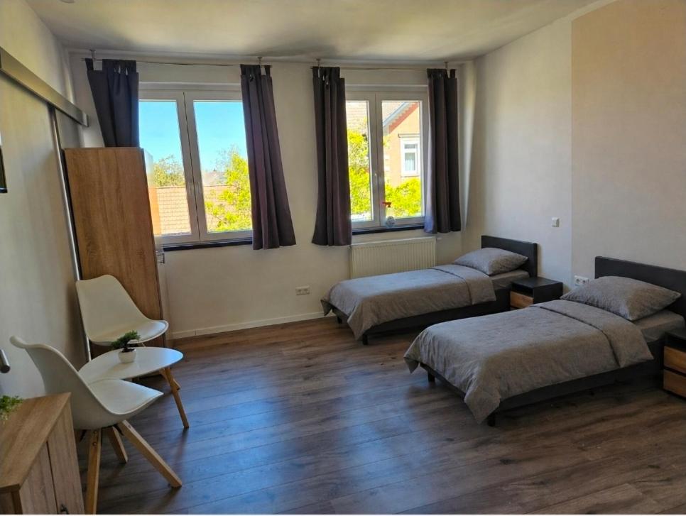 Doppel- oder Zweibettzimmer