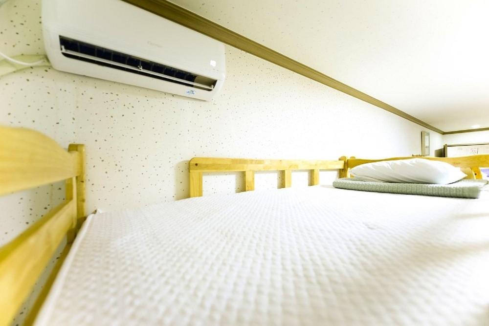 Single Bed in Female Dormitory Room