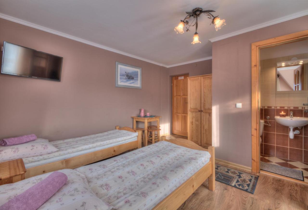 Dreibettzimmer mit Bergblick