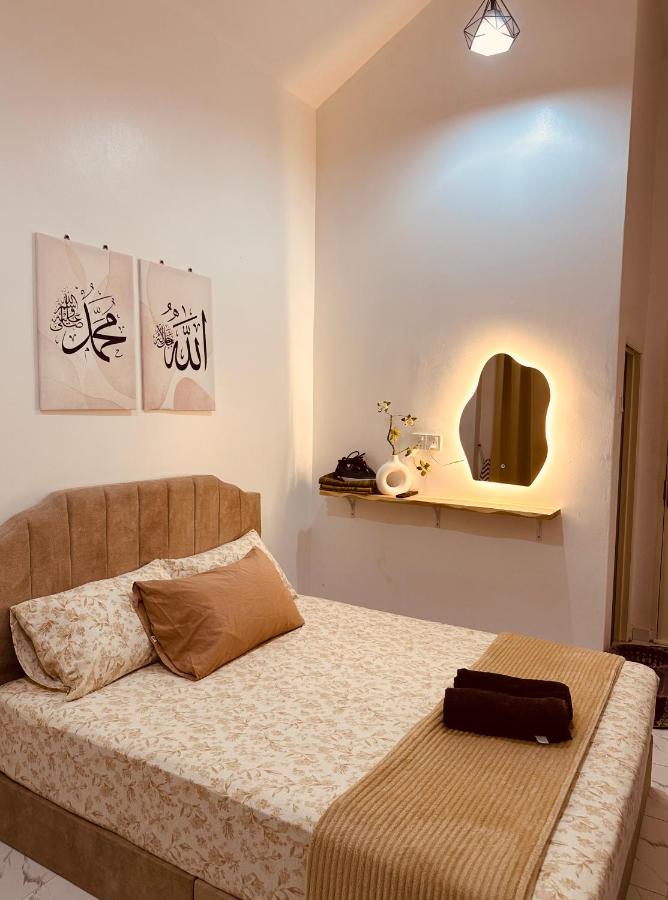Aila Roomstay TTHI - B&B Kampong Titi Haji Idris