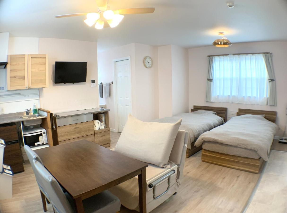 Chambre Triple avec Salle de Bains Privative