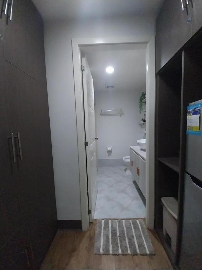 Condo unit near Mactan Airport with Pool, Gym, Free WiFi, and Netflix - Chambres d'hôtes Pusok