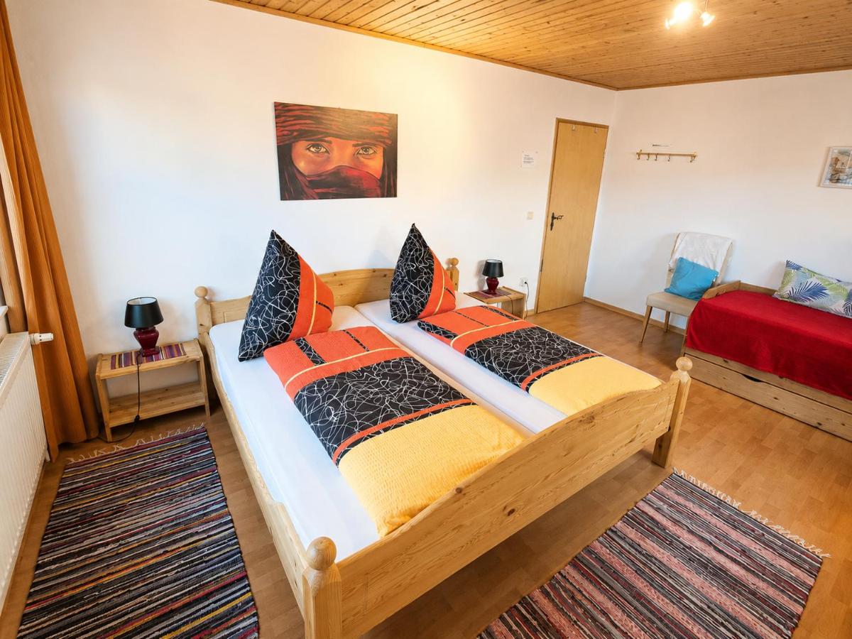Camera Tripla con Bagno in Comune