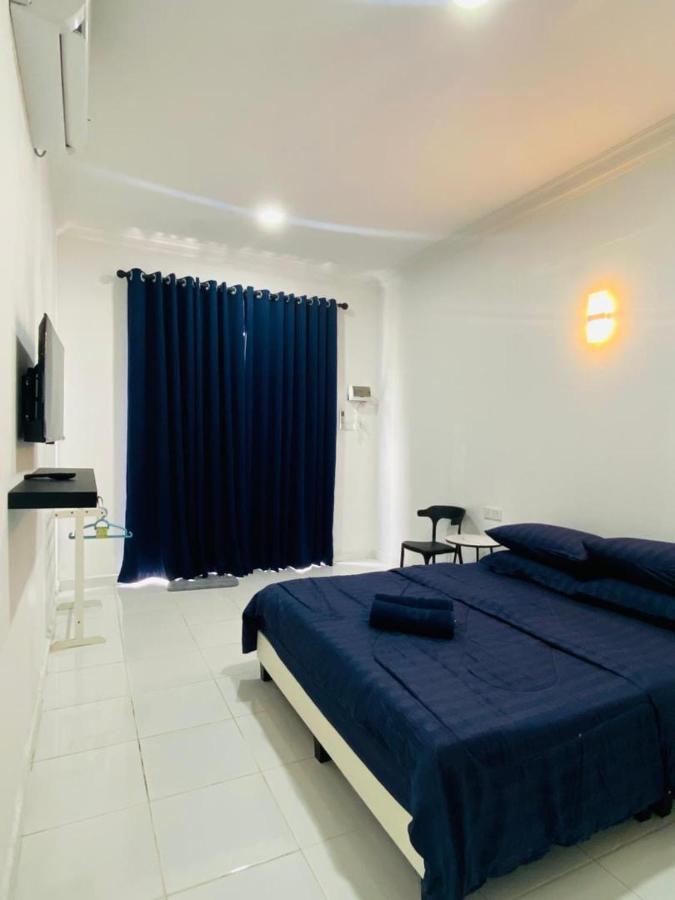 D'Tanjung Roomstay - Ferienwohnung Kampung Bari Kecil
