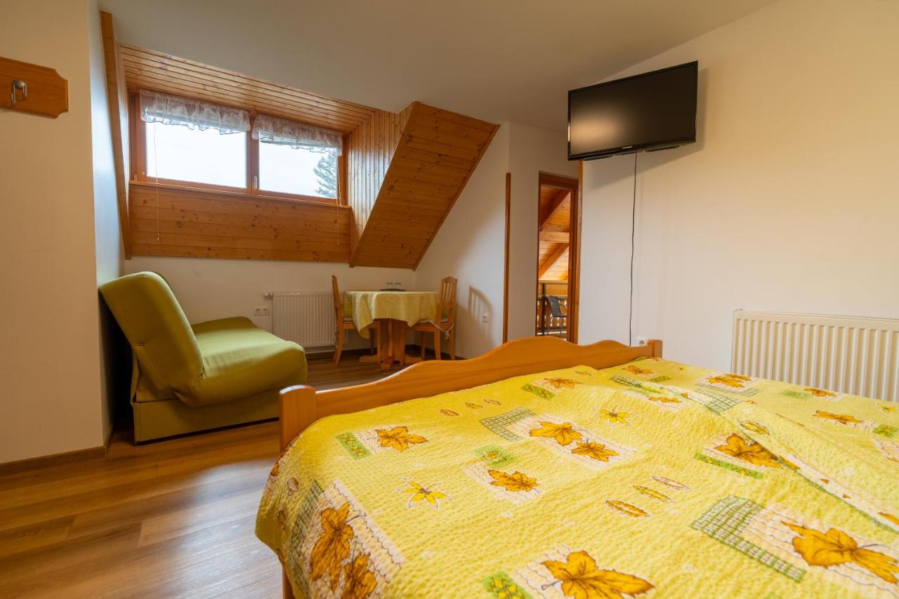 Dreibettzimmer mit Balkon