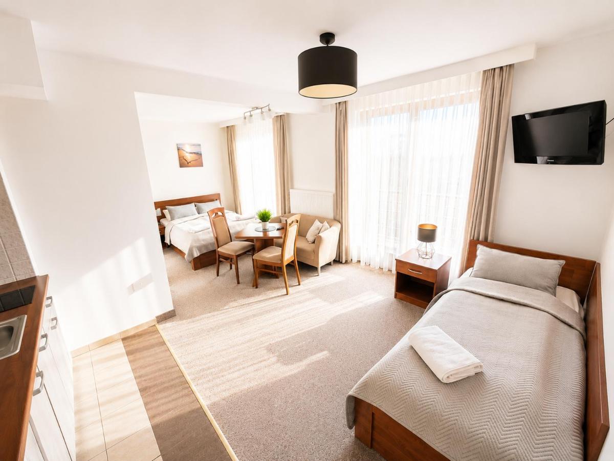 Deluxe Triple Room with Kitchenette