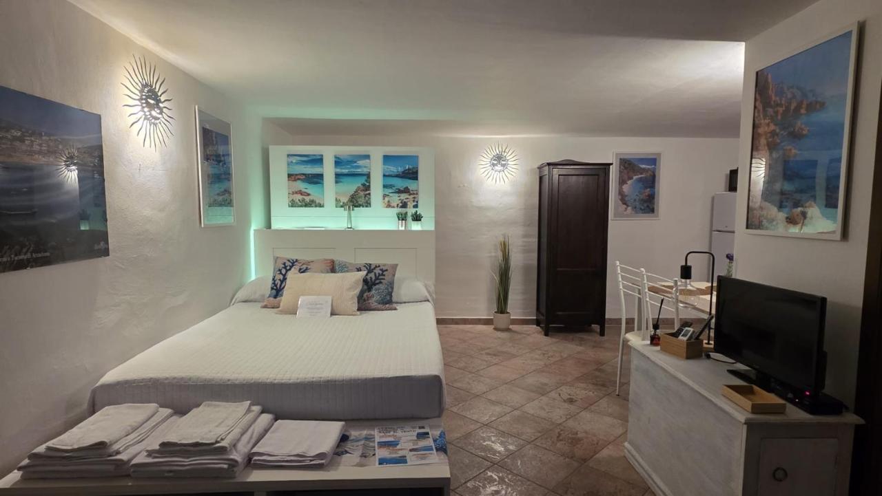 Accogliente monolocale con giardino privato - B&B Cannigione