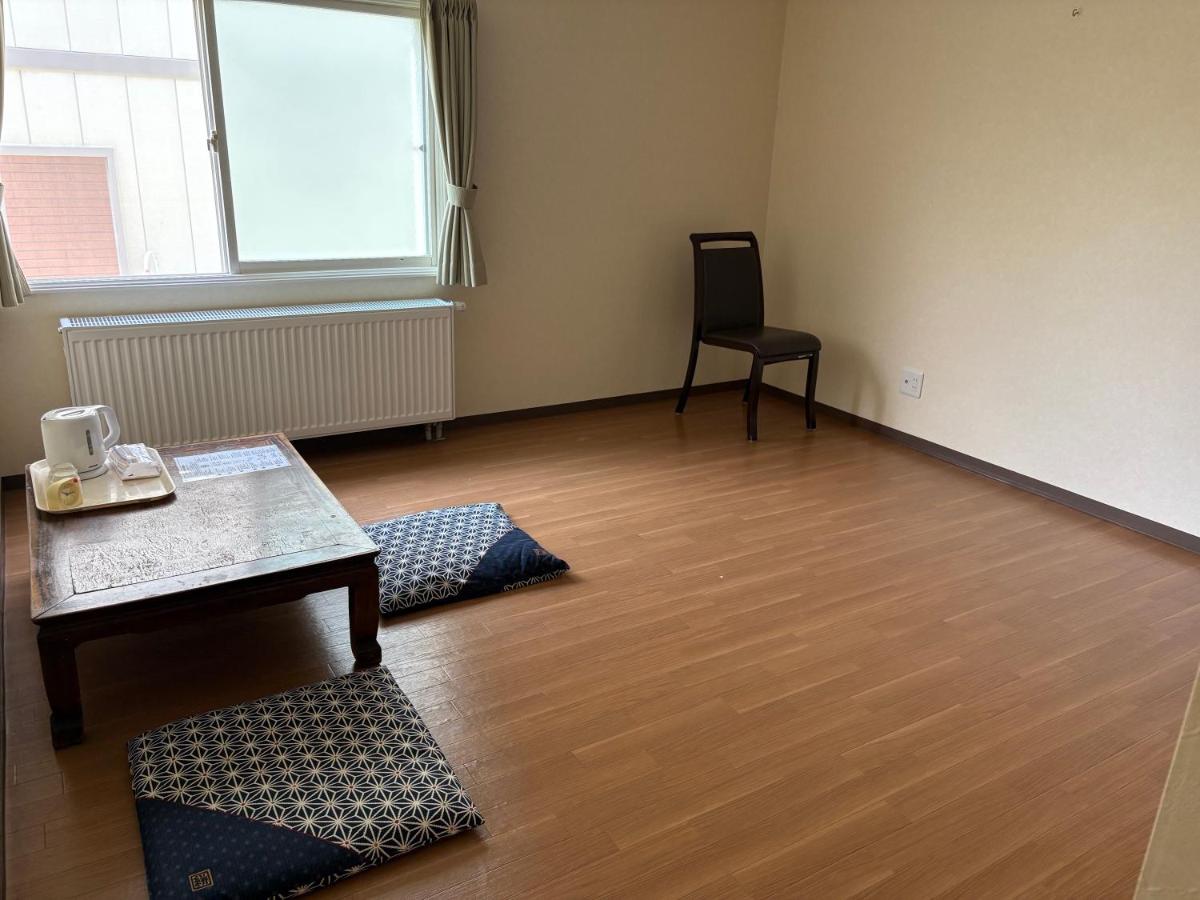 Triple Room with Shared Bathroom