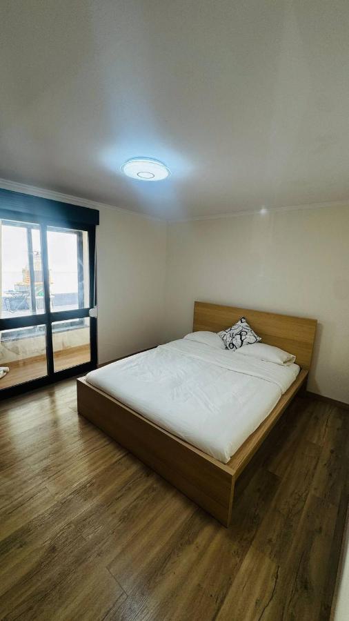 Cozy 2-Bedroom Apartment in Pontinha, Portugal - Chambres d'hôtes Pontinha