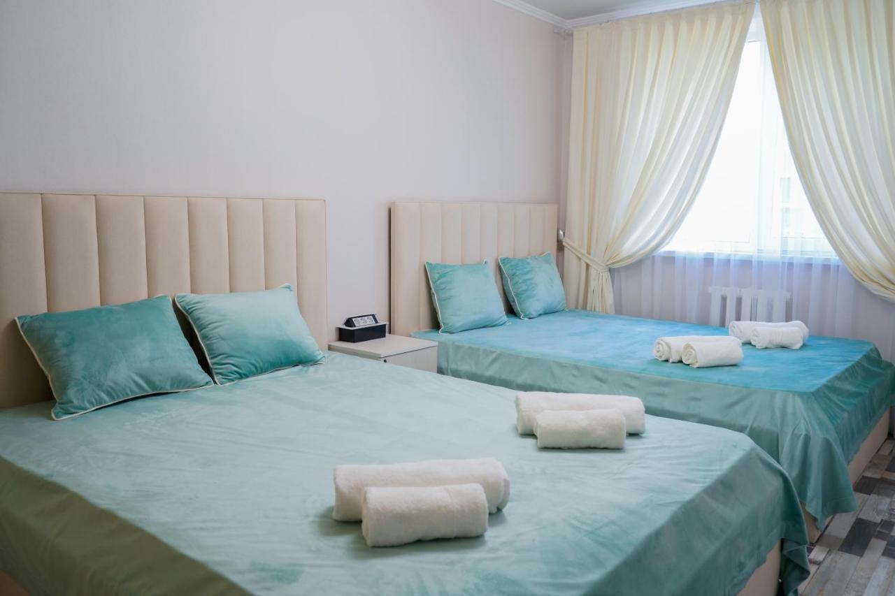 Уютная 3-х комнатная квартира- студия в центре на против акимата - Chambres d'hôtes Chymkent