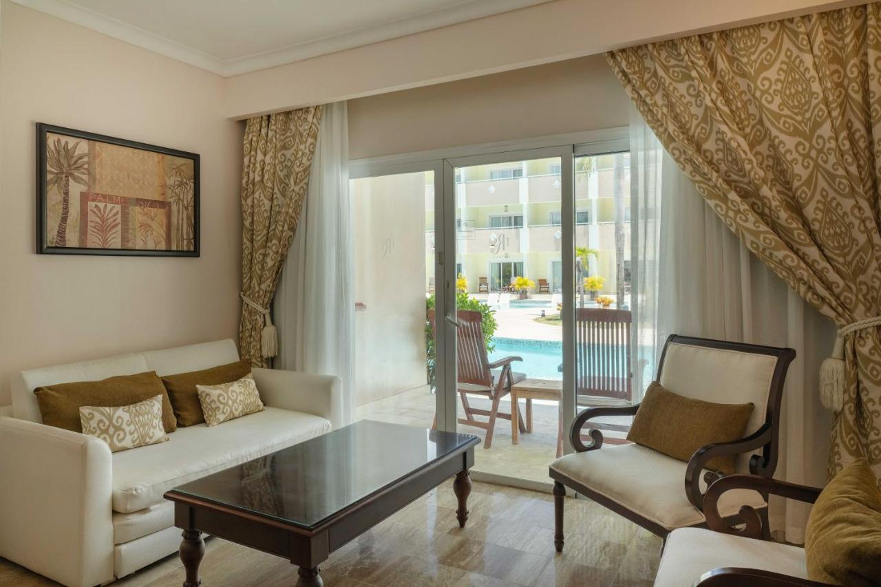 White sofa with pillows sits at dog-friendly TRS Turquesa Hotel - Adults Only - All Inclusive in Punta Cana.