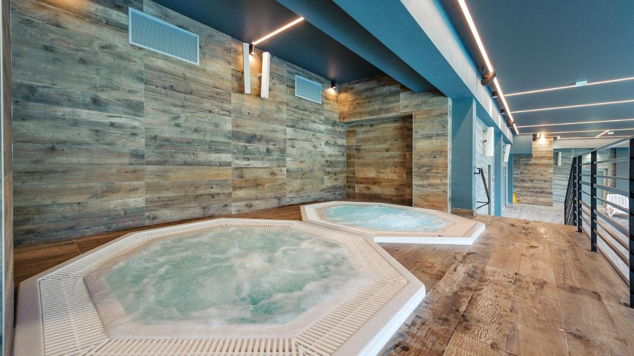 Apartamenty Kapitańskie Kasprowicza 20A taras basen jacuzzi sauny grota solna - Chambres d'hôtes Kołobrzeg