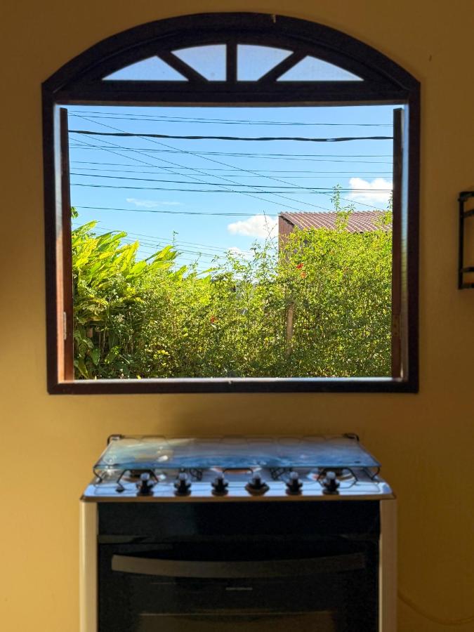 Stainless steel stove with black oven door sits at dog-friendly Casa Magna in Itacare.