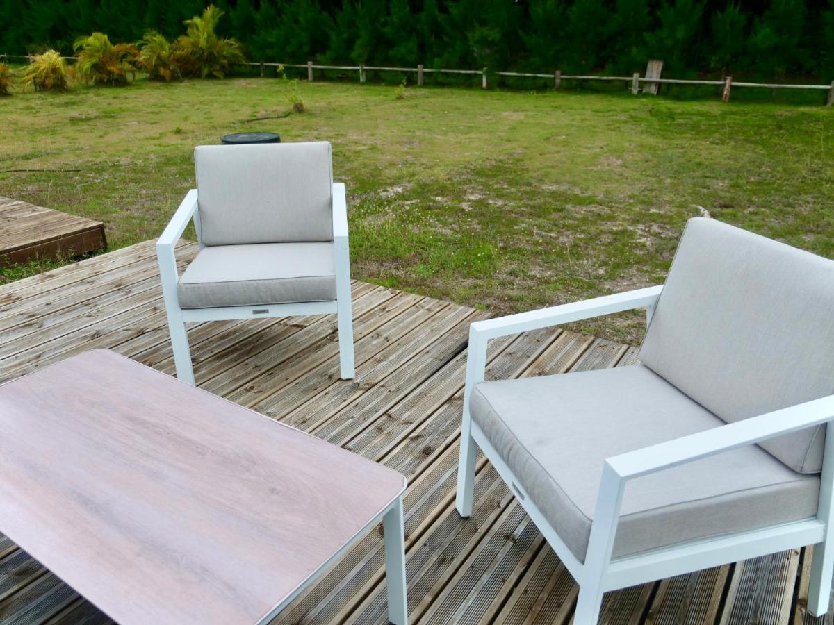 Charmant bungalow T2 avec grand jardin et accès privé plage - Ferienwohnung Grand-Bourg
