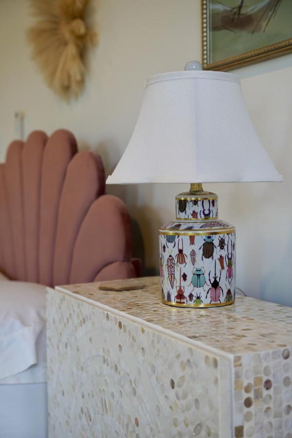 White lamp sits on nightstand at dog-friendly Parkway House Goshen Bed and Breakfast Suite 1 in Goshen, NY.