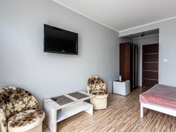 Doppelzimmer mit Balkon (2 Erwachsene + 1 Kind)