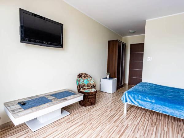 Doppelzimmer mit Balkon (2 Erwachsene + 1 Kind)