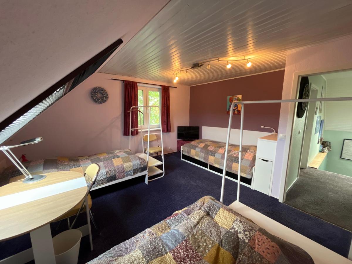 Dreibettzimmer mit Gemeinschaftsbad