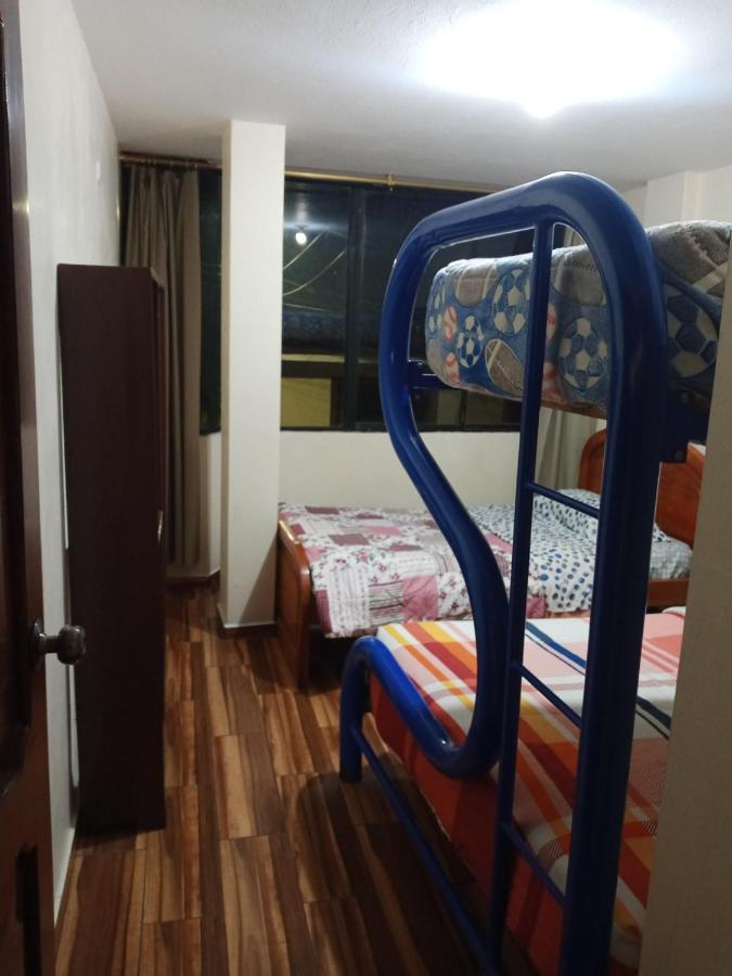 Agua caliente parqueadero cocina completa - B&B Baños