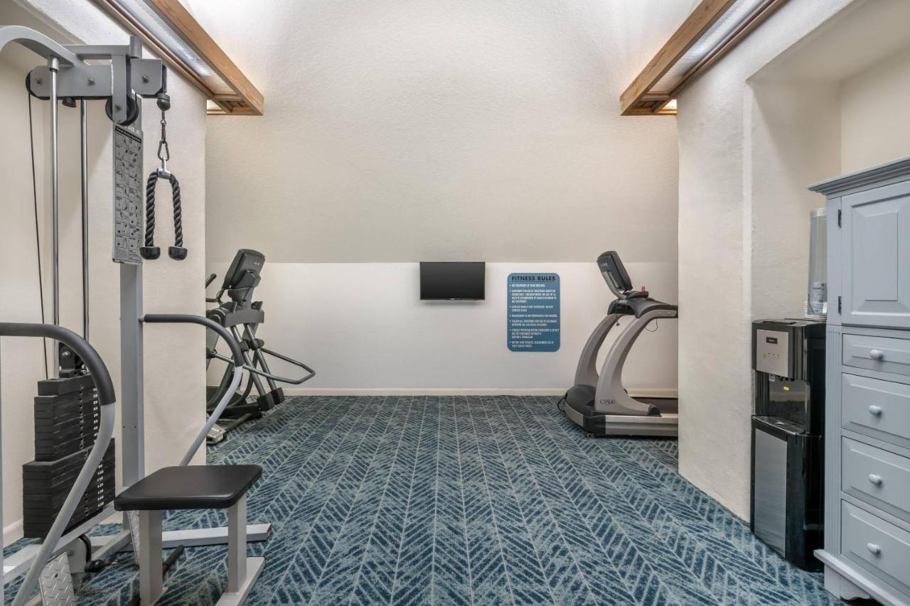 Gray treadmill stands at dog-friendly Coconut Palms Beach Resort II an Ascend Collection Hotel in New Smyrna Beach, FL.