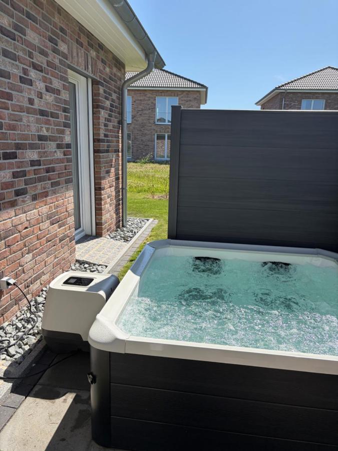 Nord & Wind Ruhiges Ferienhaus mit Wallbox & Whirlpool 800 m zur Nordsee - B&B Büsum
