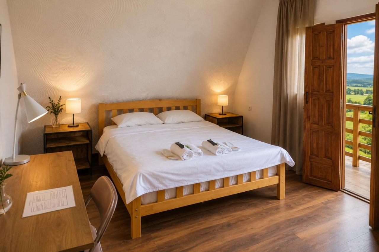 Kamer met Queensize Bed en Balkon