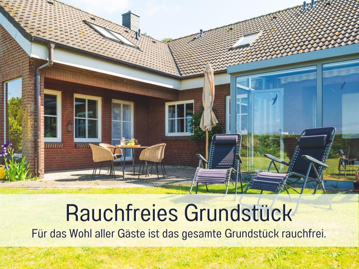 Huus Binnensee - Erdgeschoss-Wohnung mit Garten & Seeblick - Wintergarten & Terrasse - hundefreundlich - ruhige Lage - Südstrand 5 Min mit Rad - Chambres d'hôtes Fehmarn