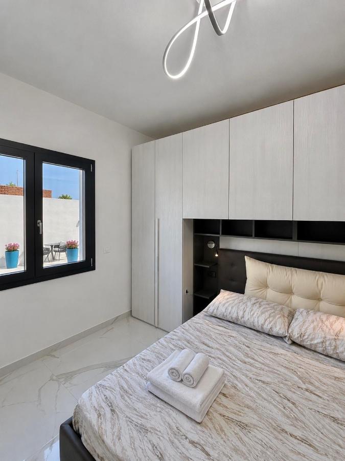 PoliHome - Chambres d'hôtes Monserrato