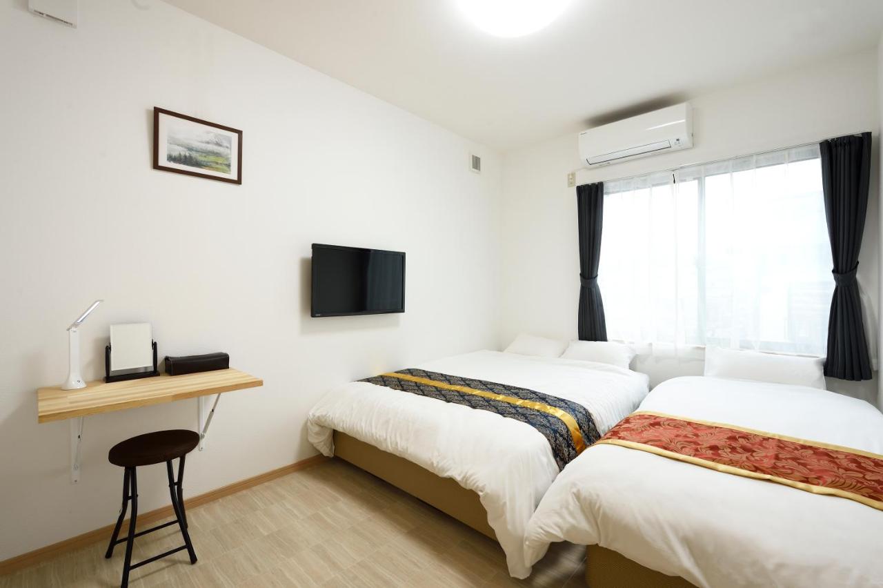 Triple Room with Shared Bathroom