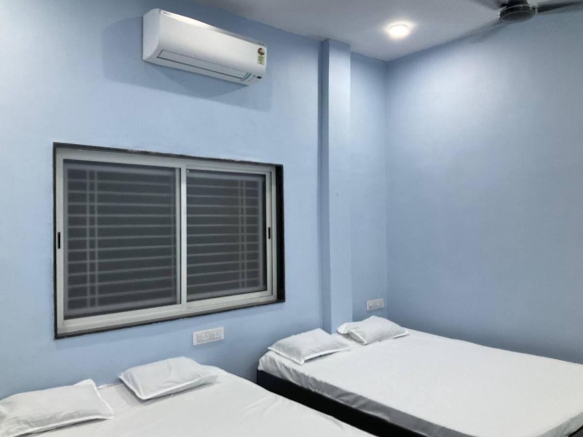 Shiv Guest House - Chambres d'hôtes Shegaon