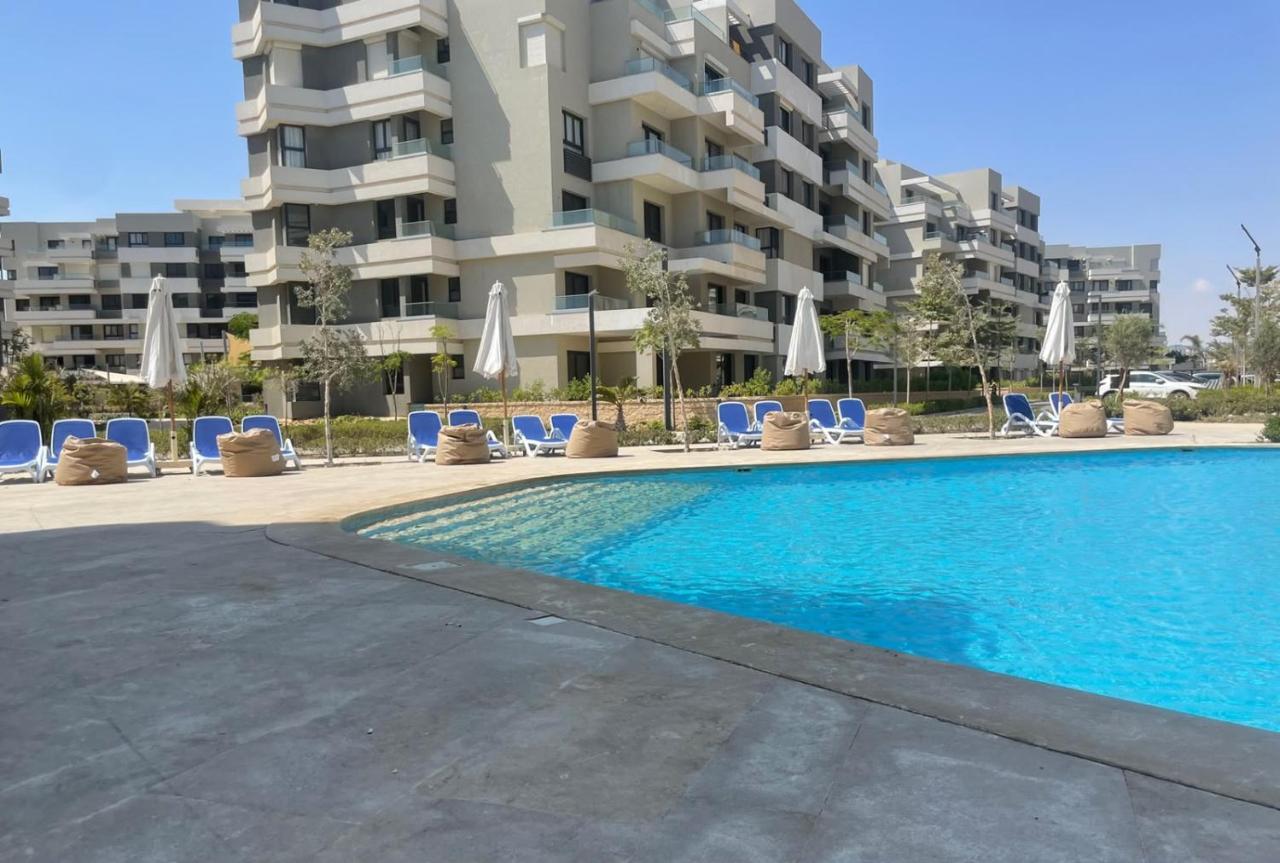 Chic Apt in Palm Hills Pool & Sea View شقة فاخرة بفيو بحر وحمام سباحة - B&B El Alamein