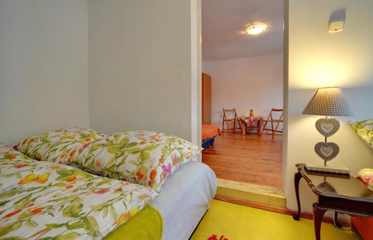 Camera Familiare con Bagno in Comune