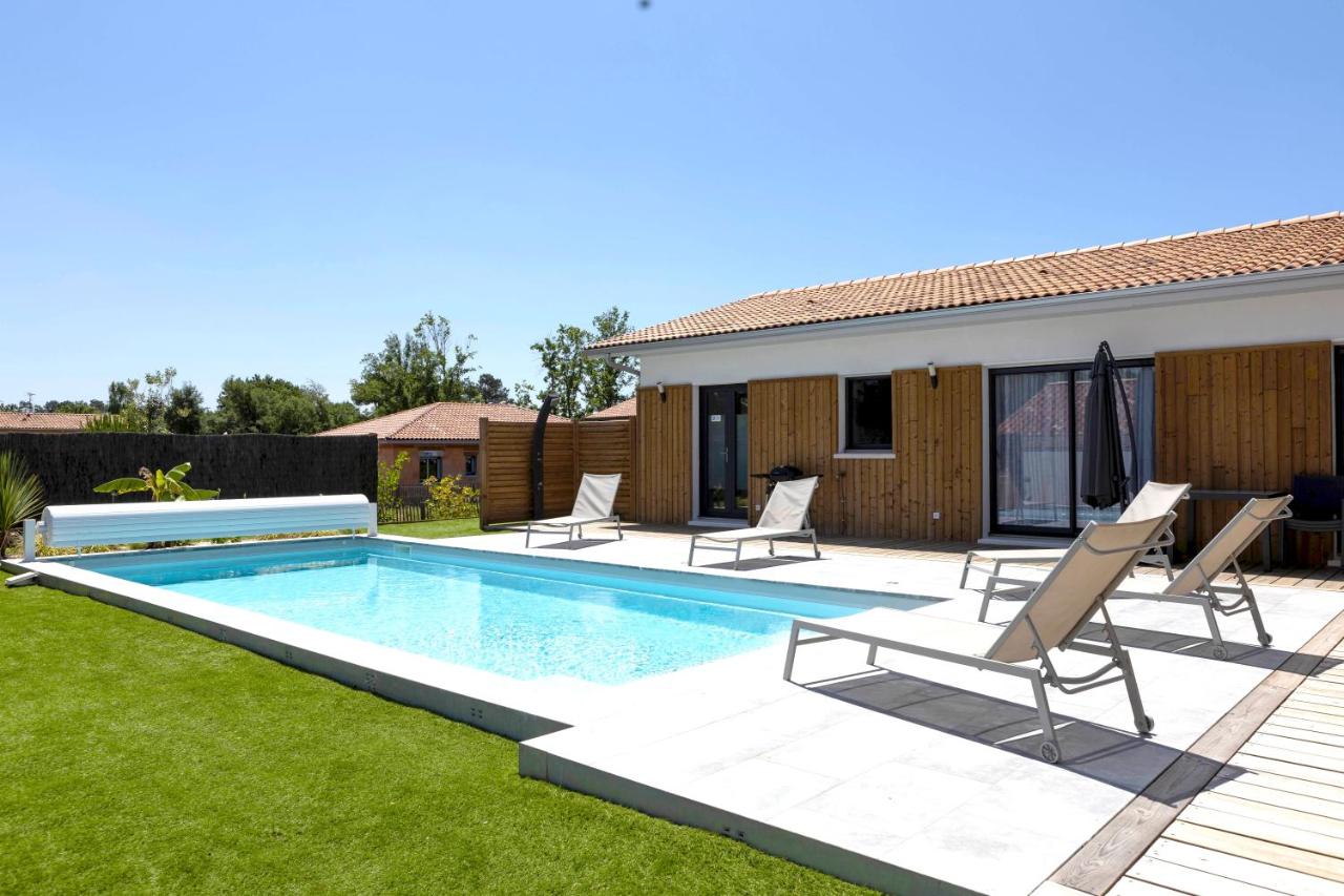 Villa Chrisaline, climatisée, 3 espaces de vie, piscine chauffée, Plages, Golf - B&B Moliets-et-Maa
